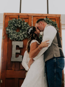 couple kissing on their wedding day at Hotel Renovo